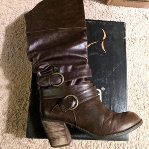 Knee high, stacked heel boots